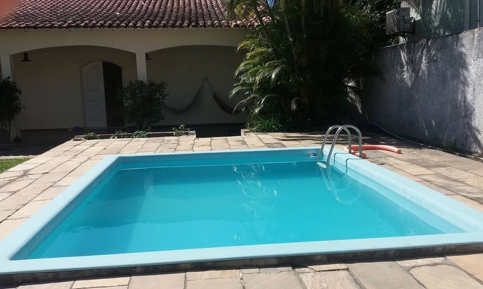 Palmeiras Casa | Hermosa casa con piscina y barbacoa.