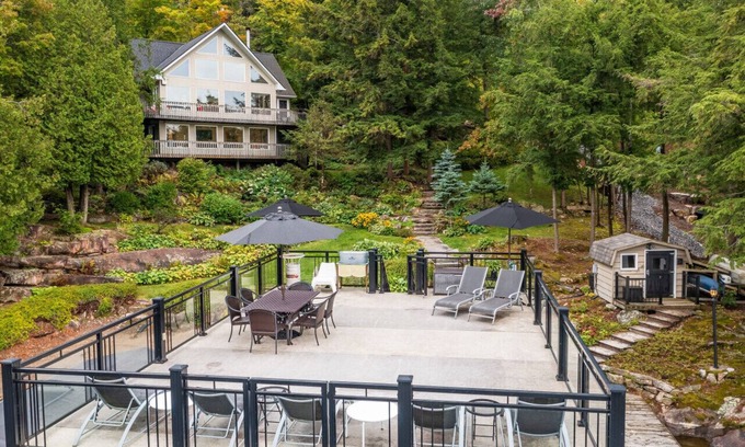 Muskoka Lakes Cabaña | Beautifully landscaped with a sandy beach, outdoor sauna, hot-tub and ample water toys.