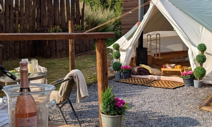 Washford Cabina | Bell tent in ultimate luxury with a wood fired hot tub, super king size bed