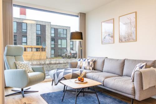 Marienleuchte Apartamento | BeltBlick 19 – Exklusive Ferienwohnung mit Garten und Meerblick