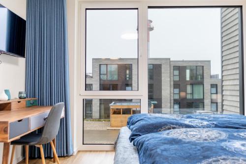 Marienleuchte Apartamento | BeltBlick21 - Familienfreundliche Ferienwohnung mit Sauna & Meerblick!