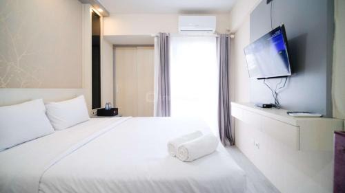 Sidoarjo Apartamento | Best Deal and Restful Studio Apartment Suncity Residence By Travelio