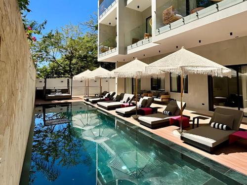 Carmen Hotel | Blooma Boutique Hotel