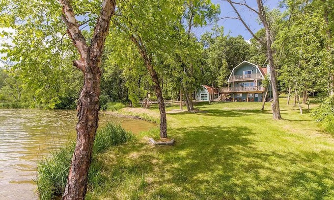 Breezy Point Cabina | Blue Ox Barn: a cozy Minnesota lakehouse with private beach and incredible views