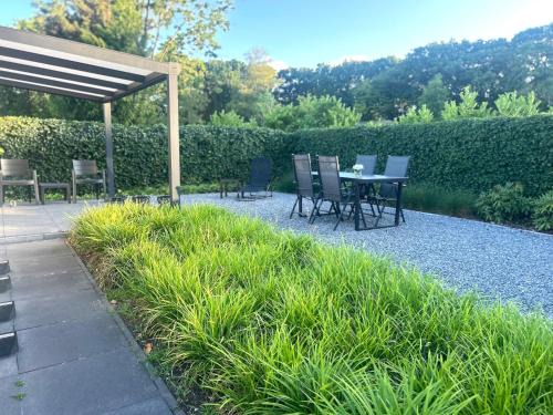 Oisterwijk Chalet De Esquí | Bosparel met ruime tuin en airco!