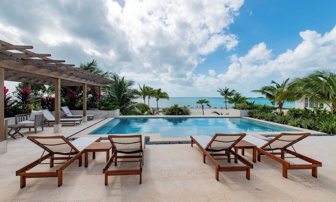 South Palmetto Point Casa | Brand New Estate with Pool & Private Backyard Beach on Calm Caribbean