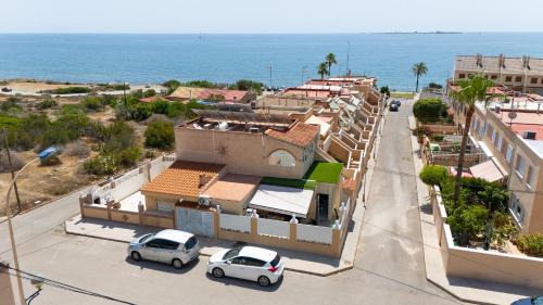Santa Pola Apartamento | CASA Adosada obra nueva Calas santa pola del este 50 metros del mar