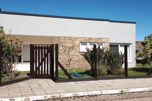 Xangri-La Casa | Casa com 4 dormitórios e piscina em Xangri-lá