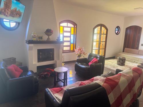 Sao Bento do Sapucai Casa | Casa com lareira em São Bento