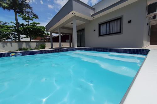 Palhoca Casa | Casa com piscina praia da Pinheira - Brisa das Amendoeiras