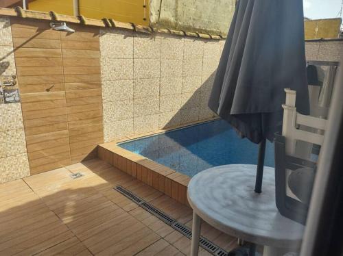 Cibratel II Casa | Casa cond fechado com Piscina diária grátis
