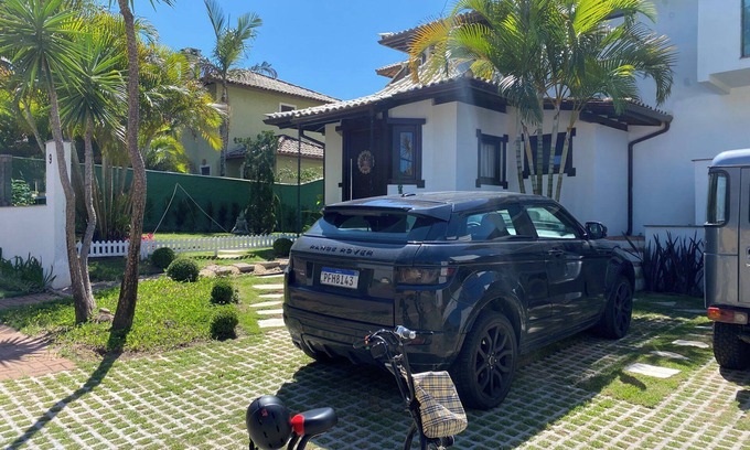 Porto da Lagoa Casa | Casa de Praia com Trilha Privativa em Condomínio Fechado