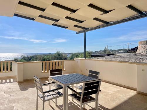 Marina di Felloniche Casa | CASA ELAIO - immersa negli ulivi con vista sul mare Ionio