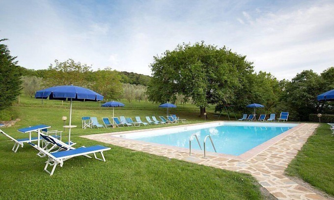 Castiglione d'Orcia Casa | Casa Salvia F: un apartamento en el estilo característico de la campiña toscana.