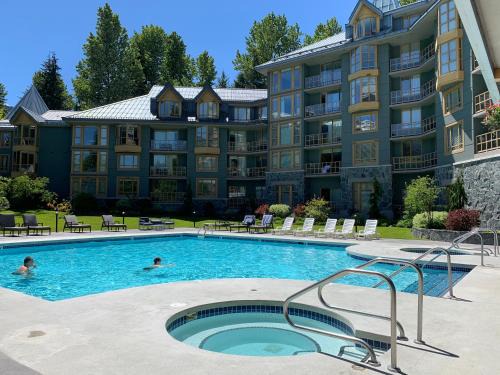 Village North Hotel | Cascade Lodge suite with 2 hot tubs pool gym sauna cable TV Wi-Fi