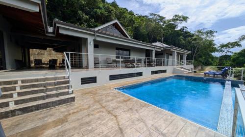 San Ignacio Villa | Cayo Casa Grande Modular Villa with Pool, Gym & Valley Views