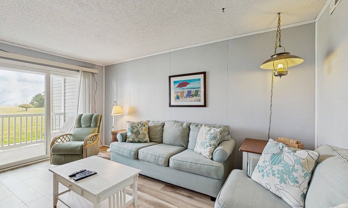 Ocean View Condominio | Cedar Shores condo with shared pool, private balcony, WiFi, & stunning bay views