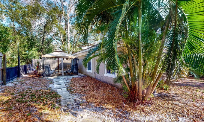 Casselberry Casa | Centrally located home with a firepit, large yard