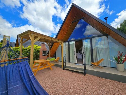 Campo Alegre Chalet De Esquí | Chalé com banheira de hidromassagem e lareira l Chalé Azul