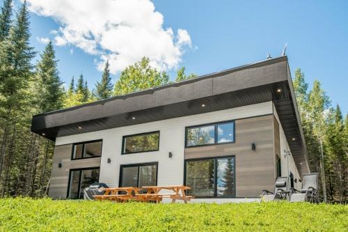 Ferland-et-Boilleau Chalet De Esquí | Chalet à louer au bord d'un lac avec spa