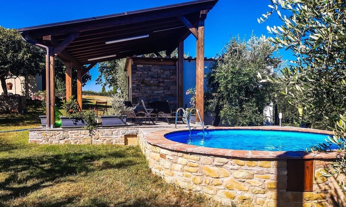 Foiano della Chiana Apartamento | Pequeña villa de piedra con un gran jardín con capacidad para 3 personas. Wi-fi. Foiano della Chiana.