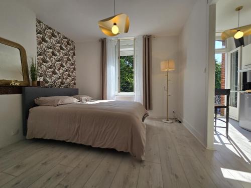 Tarbes Apartamento | Charmant appartement chambre, cuisine et salle de bain avec balcon sur Jardin Massey