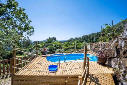 Mondim de Basto Casa | Charming house in Vilar de Ferreiros with shared pool