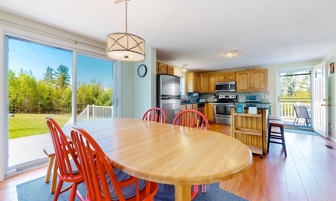 Lisbon Casa | Charming Landaff home with a deck, firepit, fireplace, partial AC, and W/D