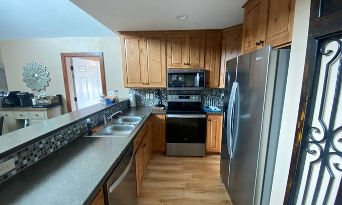 Arnolds Park Casa | Charming upscale vacation cottage on the pond in the Bridges Bay Resort property