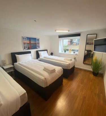 Neumuenster Apartamento | City Apartments direkt am Hauptbahnhof - Perfekt für Pendler und Monteure