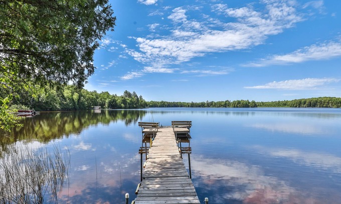 Presque Isle Casa | Classic, 5-suite, lakefront resort on South Turtle Lake with dock & firepit