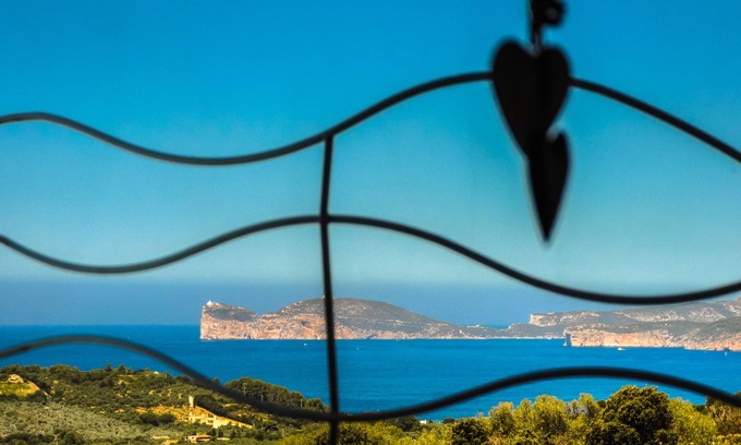 Alghero Villa | ClickSardegna Villa frente al mar, 5 dormitorios, 6 baños, piscina infinita WiFi