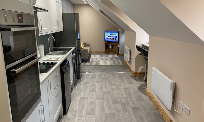 Grantham Apartamento | Apartamento-Ejecutivo-Baño privado con ducha-Vista al patio