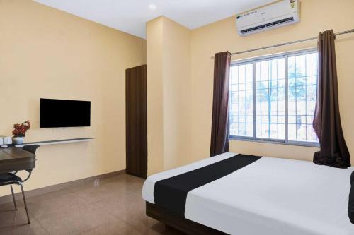 Sualkuchi Hotel | Collection O Guwahati ACA Stadium