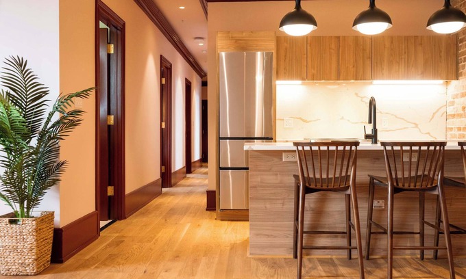 New Orleans Hotel | Colorful 4BR Suite w/ Pool steps to St. Charles Ave!