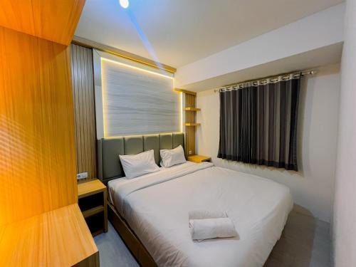 Sidoarjo Apartamento | Compact and Relaxing 2BR at Suncity Residence Apartment By Travelio