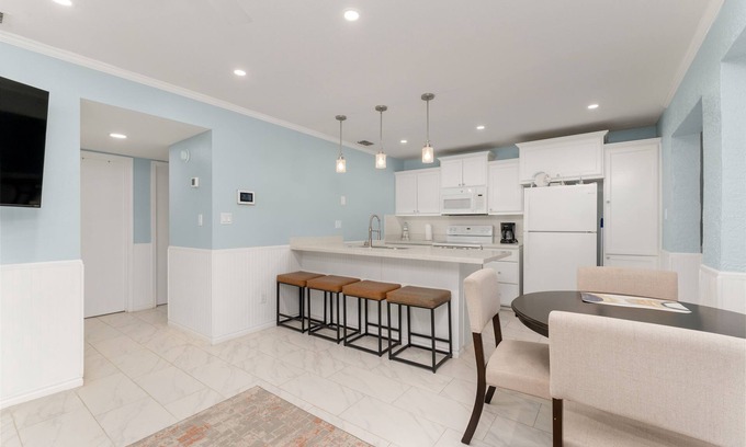 Port Isabel Condominio | Condo on the Water/ pool, fishing, boatslip, pets.