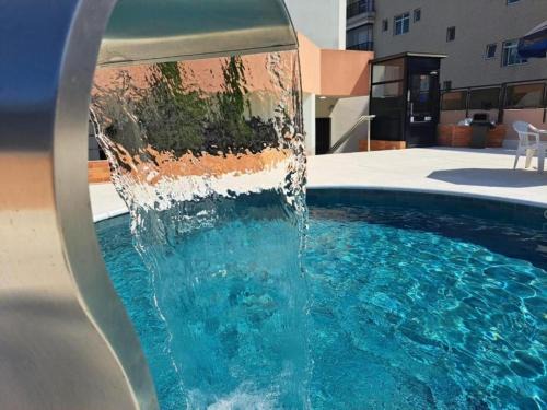 Gonzaga Apartamento | Cosmopolitan Praia Flat