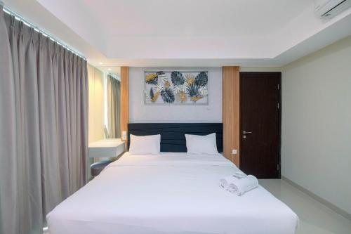 Mampang Prapatan Apartamento | Cozy 2BR Apartment Nine Residence with City View By Travelio