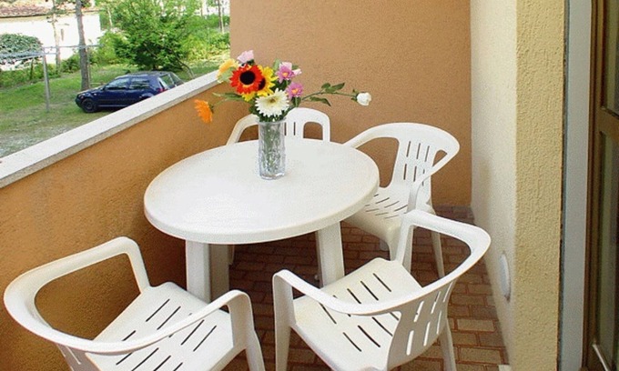 Lignano Riviera Apartamento | Acogedor piso con aire acondicionado, lavadora y lavavajillas.