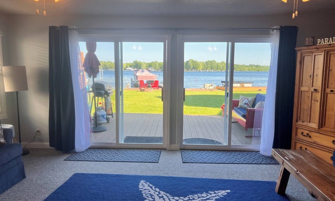 Lake Odessa Casa | Cozy Red Door Cottage on Jordan Lake - Pontoon Boat Rental available