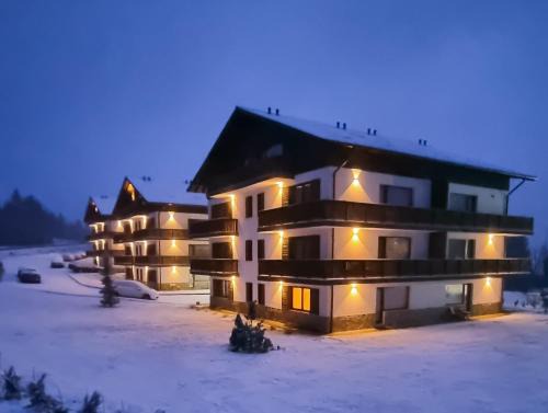 Vladeni Apartamento | Cozy Retreat Grand Chalet Aparthotel