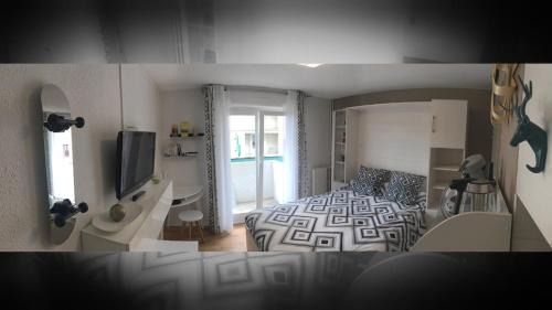 XIV Juillet Apartamento | Cozy studio with balcony and free secure parking