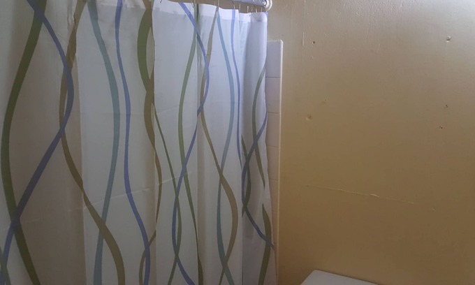 Molynes Gardens Casa | Acogedora casa de pueblo con dos dormitorios con capacidad para un máximo de cuatro personas.