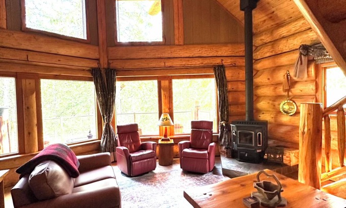 Crawford Bay Cabina | Creek side cabin in the woods with wood stove and deck - pet friendly!