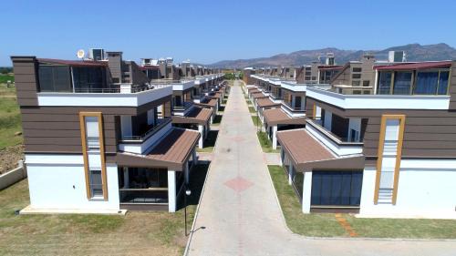 Dikili Complejo | Dikili'de Denize Sıfır Butik Sitede Müstakil Villa