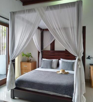 By Pass Ngurah Rai Cama Y Desayuno | Dim House Jimbaran