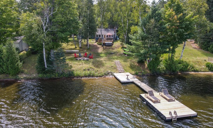 Minden Casa | Dog-friendly Lakefront Cottage w/ Hot Tub + WiFi + Firepit + Games + Near Trails