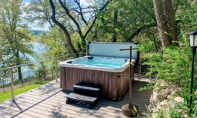 Point Pedernales Casa | Dog-friendly riverfront home with dock, private hot tub, game room, amazing view