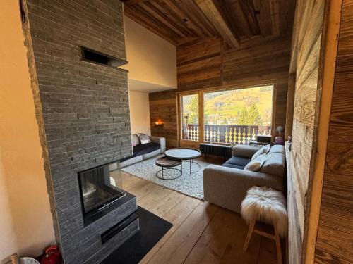 Megeve Apartamento | Duplex aux pieds des pistes à Rochebrune